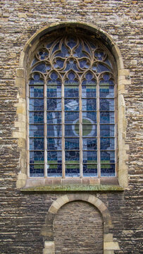 Outside view of the stained glass window of a German church from the outside. High quality photo