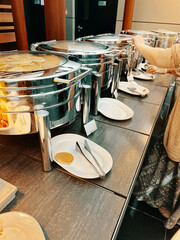 Lined up in the hotel buffet are several machines dedicated to keeping the food at the right temperature.