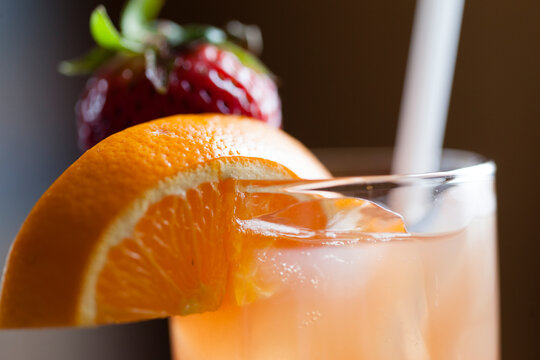 Fresh Cocktail with orange wedge