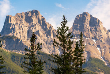Close up view of the Three Sisters Mountains in Canmore near Banff National Park during summer time...