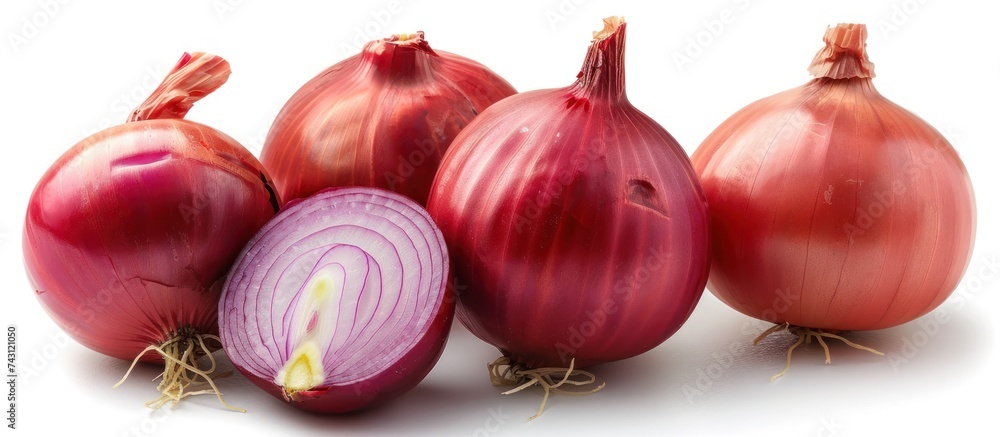 Poster multiple onions arranged in a group on a white background.