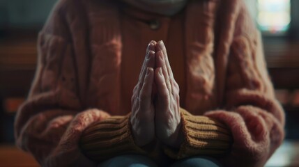 Close Up of Female Hands in Prayer Position in Church, Expressing Humility and Faith in God, Seeking Guidance and Strength. Following the Teaching of Lord Jesus Christ. Complete Devotion to Religion
