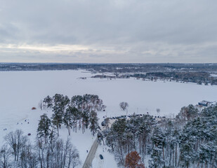 Aerial view of Pazaislis monastery in Kaunas, Lithuania in winter with an icy Kaunas lagoon in...