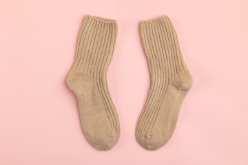 Warm wool socks on a light background