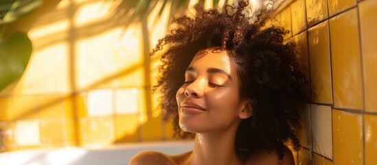 A woman is seen taking a bath in a bathtub, surrounded by soothing bubbles. She is relaxing in the warm water, enjoying a moment of self-care.
