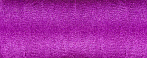 texture of threads for a sewing machine pink colors on a white background