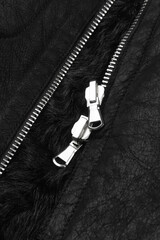 Double metal zipper on a black sheepskin coat from Shearling