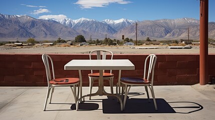 Empty tables at sidewalk cafe, Lone Pine, Inyo County, Onyx, California, USA.


