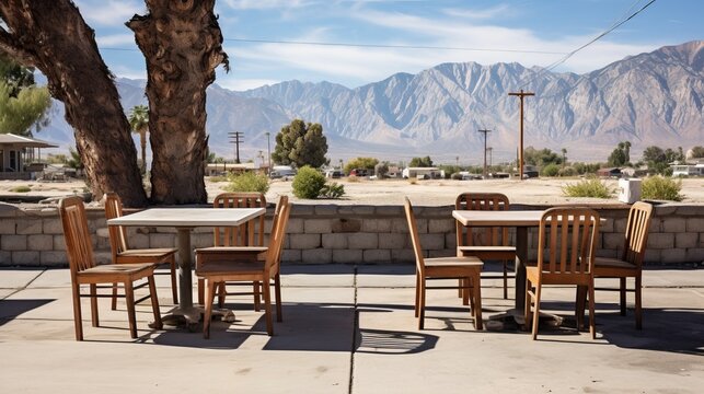 Empty tables at sidewalk cafe, Lone Pine, Inyo County, Onyx, California, USA.


