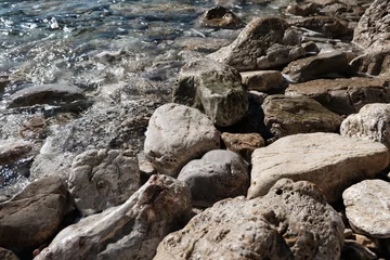 stones near sea on Mogren beach Budva Montenegro © Y