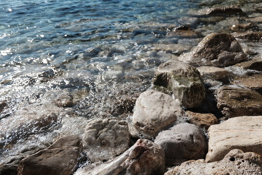 stones in sea on Mogren beach Budva Montenegro