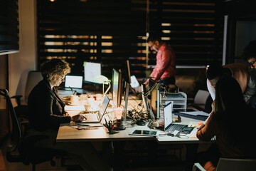 Creative Office Teamwork Analyzing Data for Business Growth