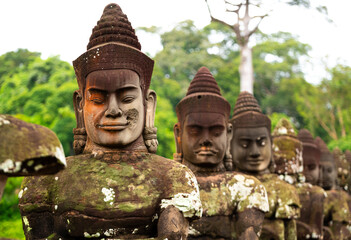 Background of a detail of the statues in the south door of the Angkor Thom complex in siem riep,...