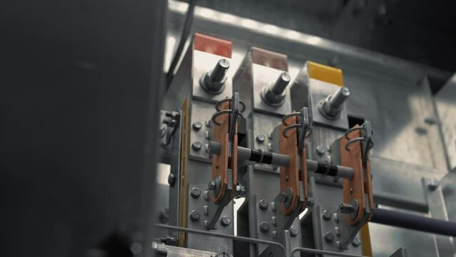 Complex electrical equipment under high voltage in an electrical room at a power plant. Close-up