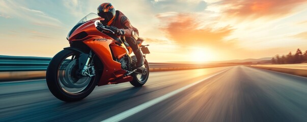 Obraz na płótnie Canvas Motorbike rider in sunset light riding with high speed