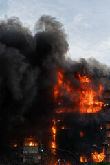 A large fire in a residential building in the city of Valencia, Spain, which quickly burns to the ground.