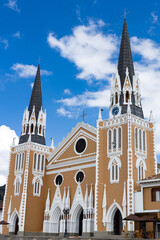 Fototapeta na wymiar Abejorral, Antioquia - Colombia. February 7, 2024. Facade of the Our Lady of Carmen church, located in the main square of the municipality