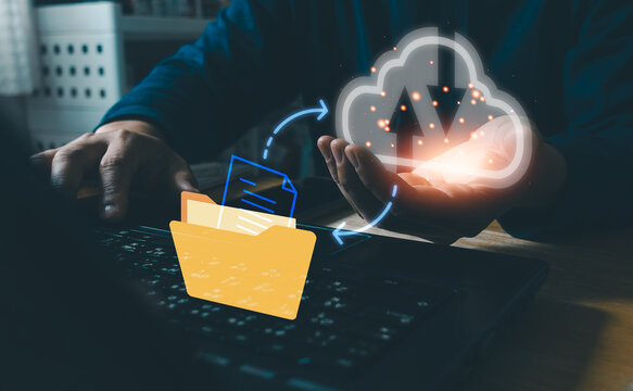 Data transfer through cloud computing concept. Business people migrate data and corporate information into cloud technology for data security and backup as disaster recovery and to prevent cybercrime.