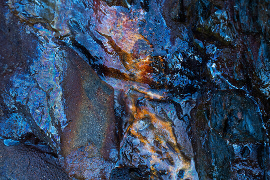 Biofilm bacteria on iron-rich rocks at Llumeres beach, Asturias