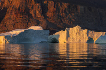 Iceberg in the sunset colors in Uummannaq Fjord
