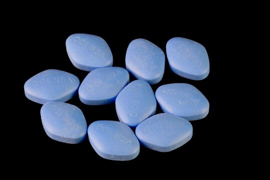 Blue Pfizer Viagra pills (Sildenafil) for male erectile dysfunction and sexual issues. New York, NY, USA - February 21
