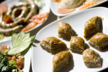 Delicious Turkish Baklava on a Plate, Traditional Eastern Dessert with Walnuts and Syrup, Mediterranean Cuisine