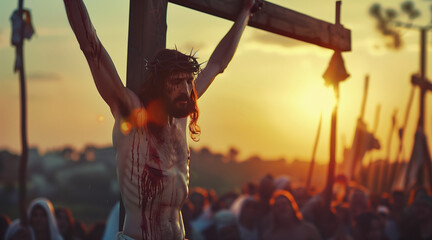 Crucifixion of Jesus Christ on the cross at Calvary against a sunset. Good friday, holy week, easter concept - obrazy, fototapety, plakaty
