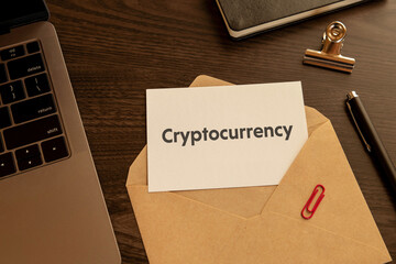 There is word card with the word Cryptocurrency. It is as an eye-catching image.