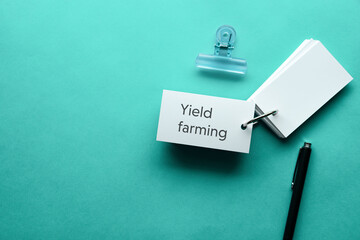 There is word card with the word Yield farming. It is as an eye-catching image.