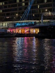 Copenhagen Cafe across water filled with colorful lights