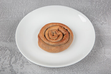 Gluten free food. Rose pastry from buckwheat flour. Homemade baked buns made of raw buckwheat with...