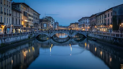 Gordijnen Bridge across the Naviglio Grande canal at the evening in Milan Italy : Generative AI © Generative AI