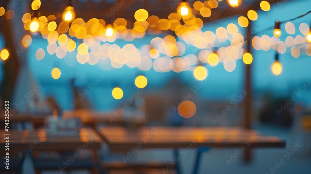 Poster blurred bokeh light with yellow string lights decor in beach restaurant at dusk of summer background : Generative AI