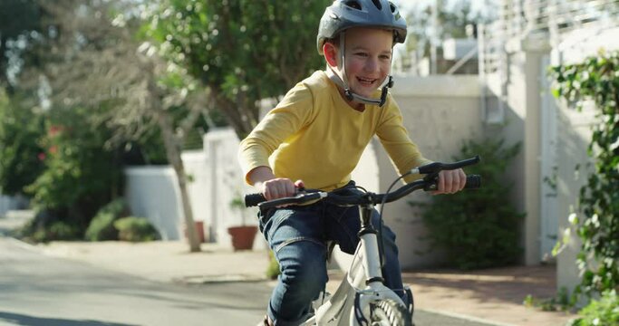 Parent, child and teaching bicycle ride for safety, closeup and outdoor street with hands. Cycling, childhood memory and riding in summer, bonding together and recreation with son, proud and happy