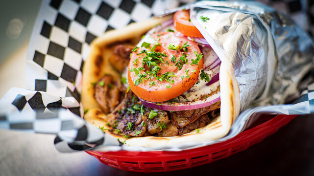 chicken shawarma sandwich on pita bread