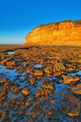 The cliffs and rocky beach at Bells Beach, Great Ocean Road, Victoria, Australia