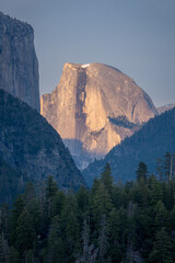 Half Dome Glows Through The Layers Of Mountains In Yellowstone