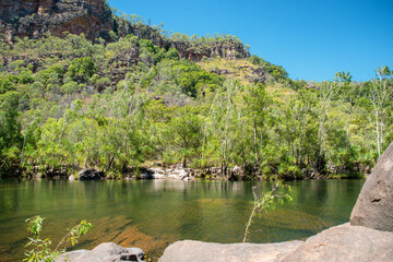 rugged Outback scenery in the Northern Territory of Australia, showcasing vast deserts, red rocks, and remote wilderness