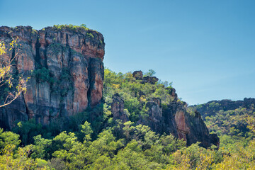 rugged Outback scenery in the Northern Territory of Australia, showcasing vast deserts, red rocks,...