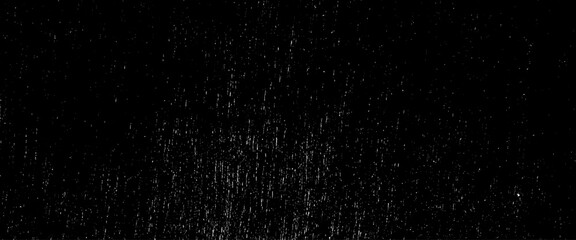 Vector snow, stars, twinkling lights, rain drops on black background, small particles of debris and dust. Distressed uneven grunge texture overlay.