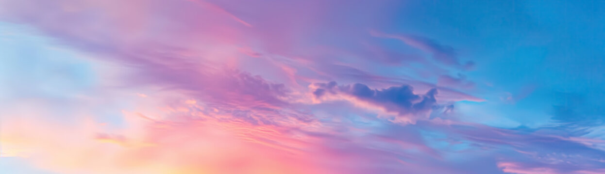 pastel colored sunset sky with cloud layers