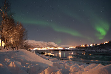 Beautiful aurora in a winter country