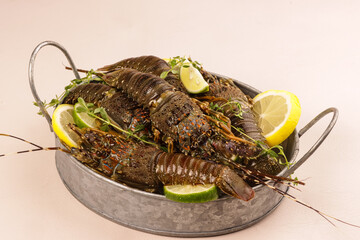 Spiny Lobster or Fresh Lobster or Rock Lobster with Lemon and Lime.