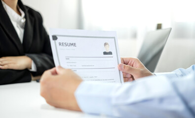 HR Manager talks to job applicants for job interviews about careers and Her personal history in the...