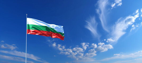 National flag of bulgaria waving in the wind against a clear blue sky - obrazy, fototapety, plakaty