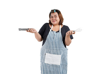 Portrait of an Asian housewife with an apron holding cooking tools. Isolated on a white background....