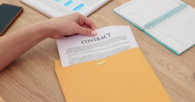 Female freelancer open envelope about signing contract in business and sign contract concept
