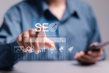 SEO concept, Promoting ranking traffic on website and optimizing your website to rank in search engines. Businessman using smartphone with search bar to analyze SEO search engine optimization.