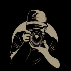 A logo illustration of a photographer with cap and camera on black background.
