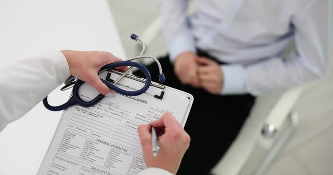Young man with health problem visits urologist in clinic